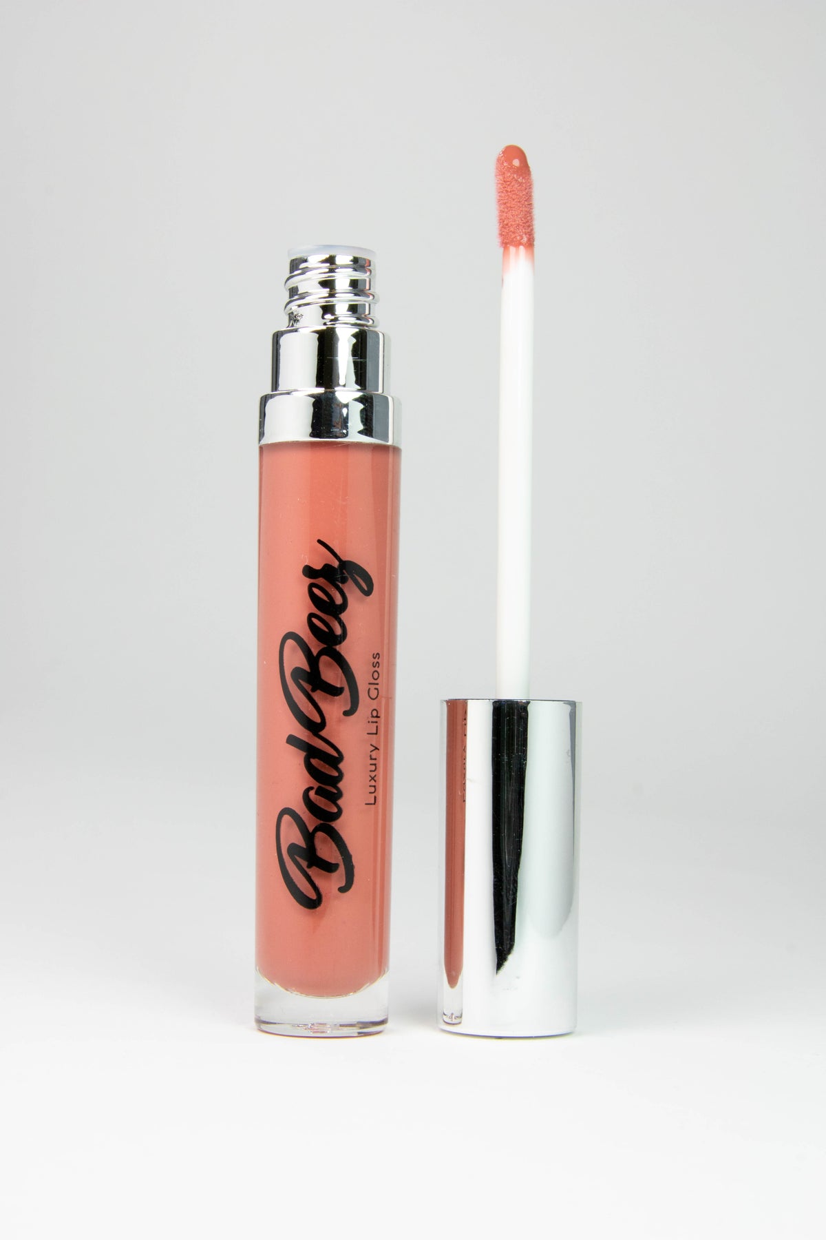 rose nude lip gloss in tube
