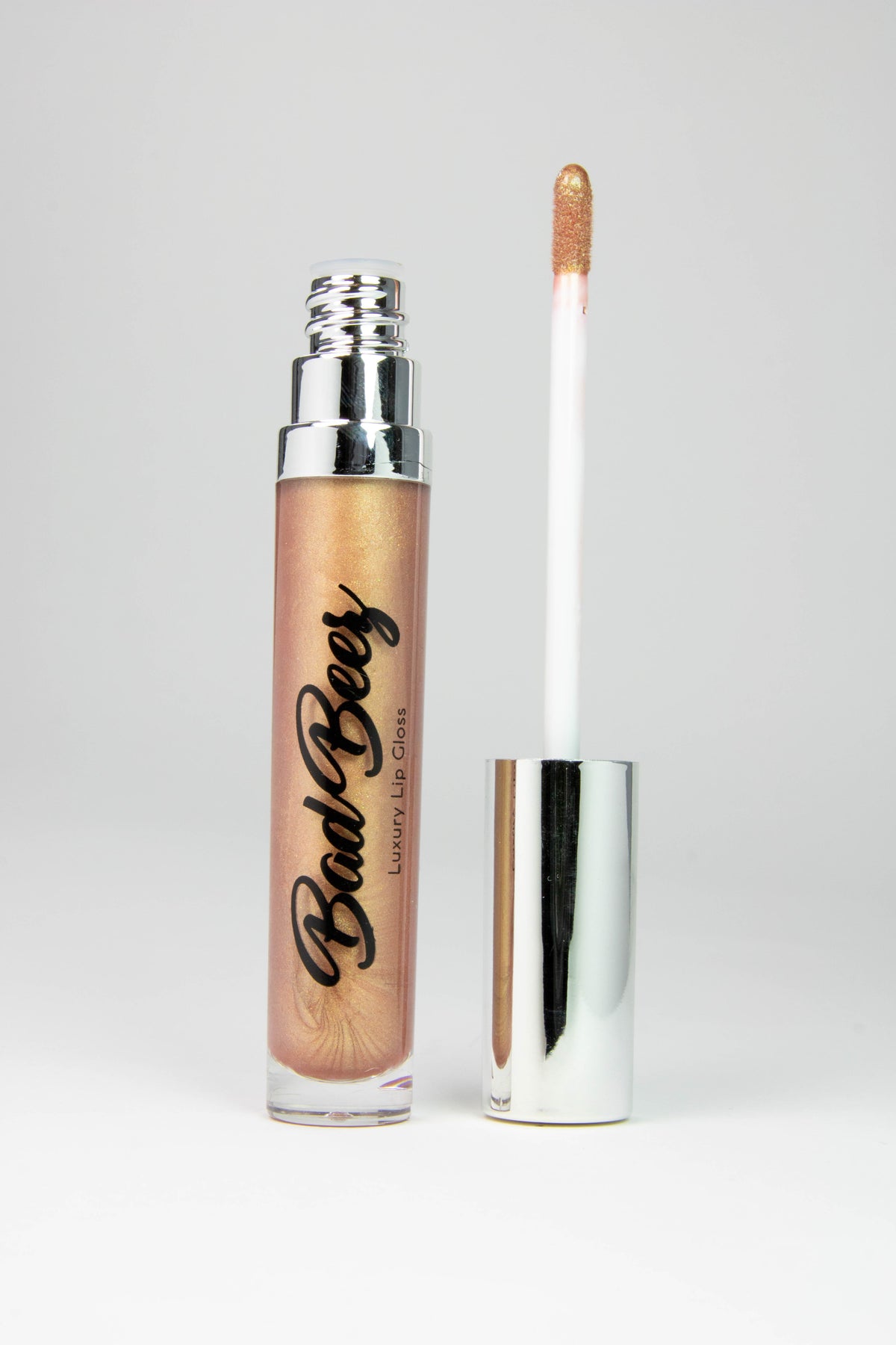 Gold tone shimmer lip gloss