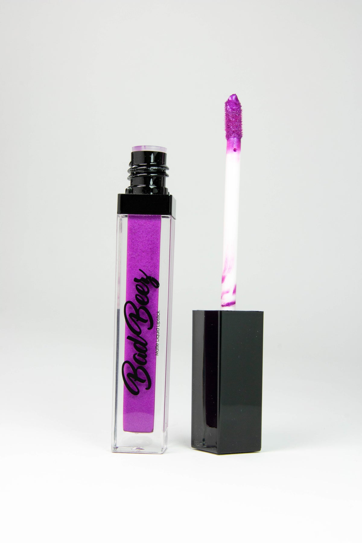 fuchsia shimmer lipstick in a tube 